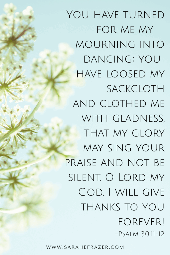 copy of Psalm 30 verses 11-12 with robin egg's  blue background and a queen anne's lace flower