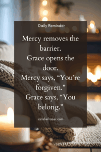 quote about mercy and grace in text box. Image behind is of a cozy fireplace with candles and soft blankets.