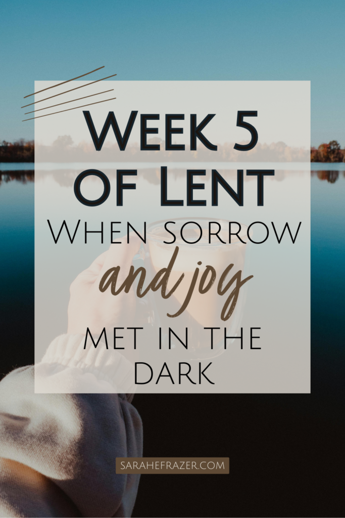 woman holds a coffee cup aloft over dusky lake. Text overlay reads: Week 5 of Lent when sorrow and joy met in the dark