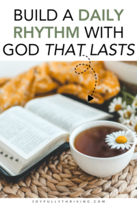 open bible a marigold napkin and a cup of chamomil tea on an open table. Text at top reads: daily rhythm with god that lasts