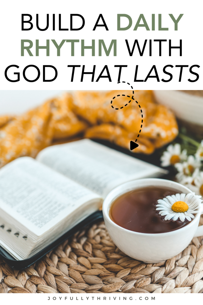 open bible a marigold napkin and a cup of chamomil tea on an open table. Text at top reads: daily rhythm with god that lasts
