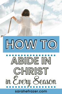 A woman on a swing looking at the sky with large text overlay: how to abide in christ in every season
