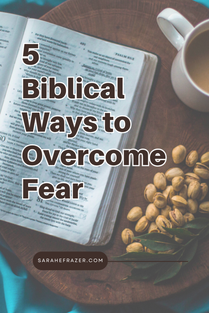 Bible open on a table with a cup of coffee and pistachio nuts. Text reads: 5 Biblical ways to overcome fear