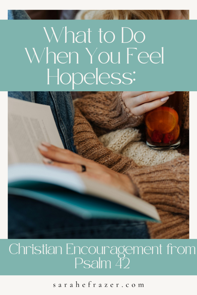 closeup of a woman reading a book holding. a mug of tea. Text reads" what to do when you feel hopeless: Christian encouragement from Psalm 42