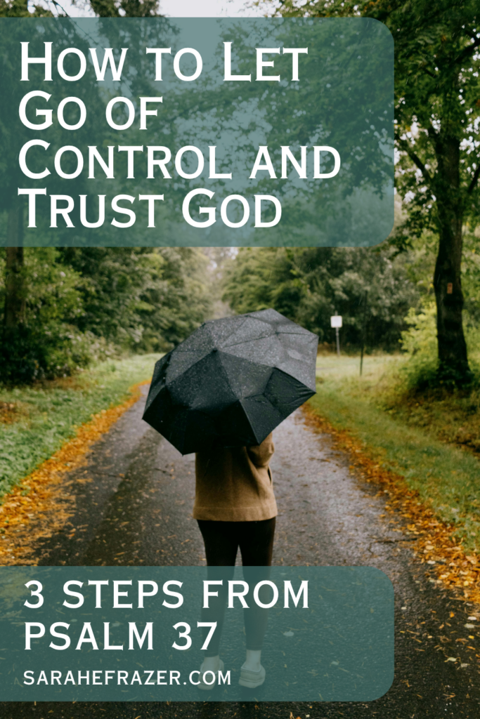 woman stands on a footpath with an umbrella in the rain. Text reads: how to let go of control and trust god